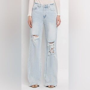 Women's Light Blue Ripped Flare Jeans
